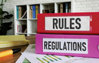 Two files stacked on top of each other titled rules and regulations