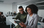 Two young professionals in an office