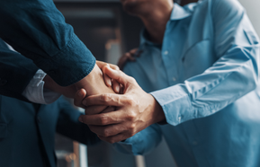 Two people shaking hands
