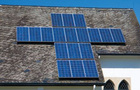 A few solar panels on a roof