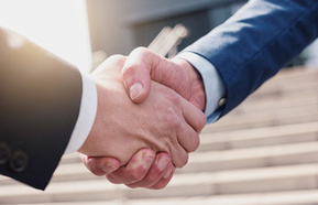 Two people shaking hands 