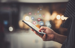 Hand holding smart phone 440.jpg