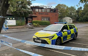 NPUK office destroyed surrounded by police car